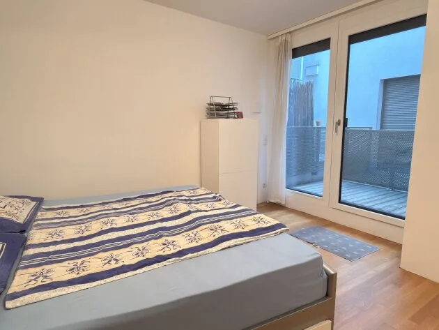 Schlafzimmer mit Zugang zur Terrasse